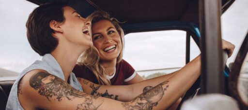 Woman driving truck with windows down