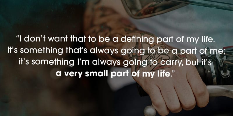 Man on a motorcycle with tattoos. Quote 
