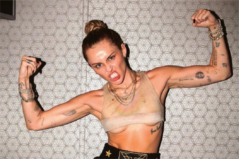 A Look at Miley Cyrus’ Tattoos and Her Tattoo Regrets