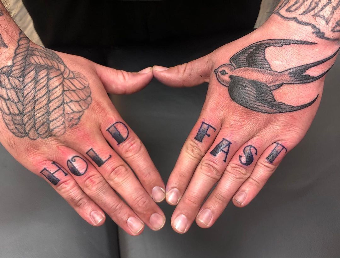 hold fast hand tattoos